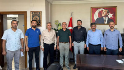 Milliyetçi Hareket Partisi (MHP) Kadirli İlçe Başkanı Severtürk Demirci,ve beraberindeki