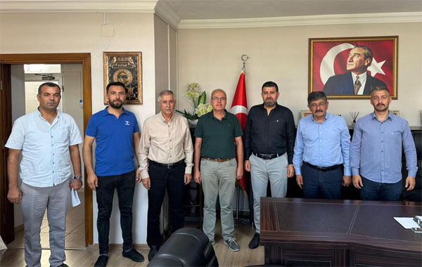 Milliyetçi Hareket Partisi (MHP) Kadirli İlçe Başkanı Severtürk Demirci,ve beraberindeki